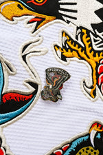 The Conflict Enamel Pin